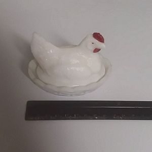 Vintage chicken on nest